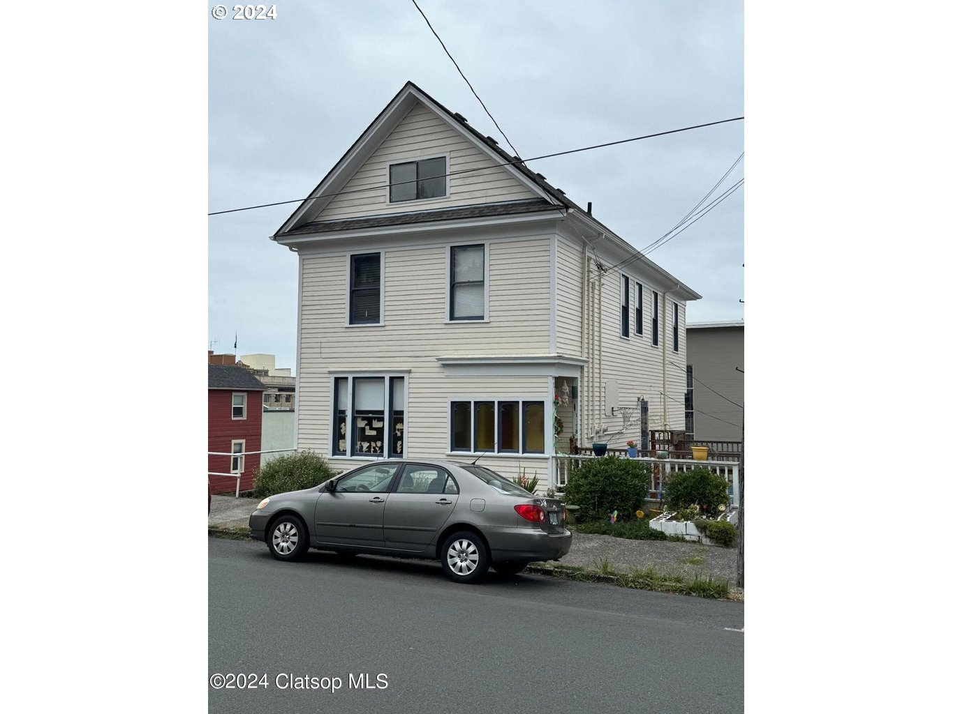 a car parked in front of a house