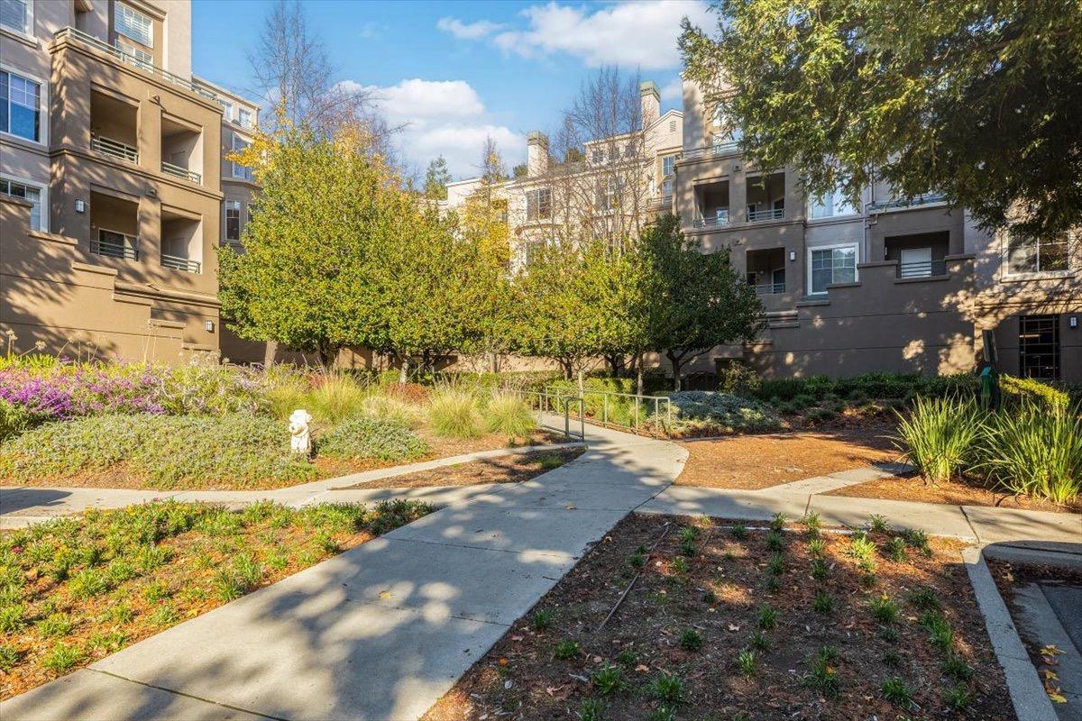 a view of residential houses with outdoor space