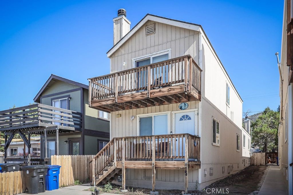 a view of a house with a deck