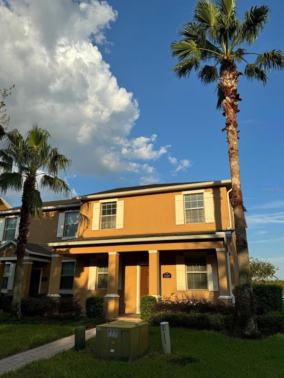 front view of a house with a yard