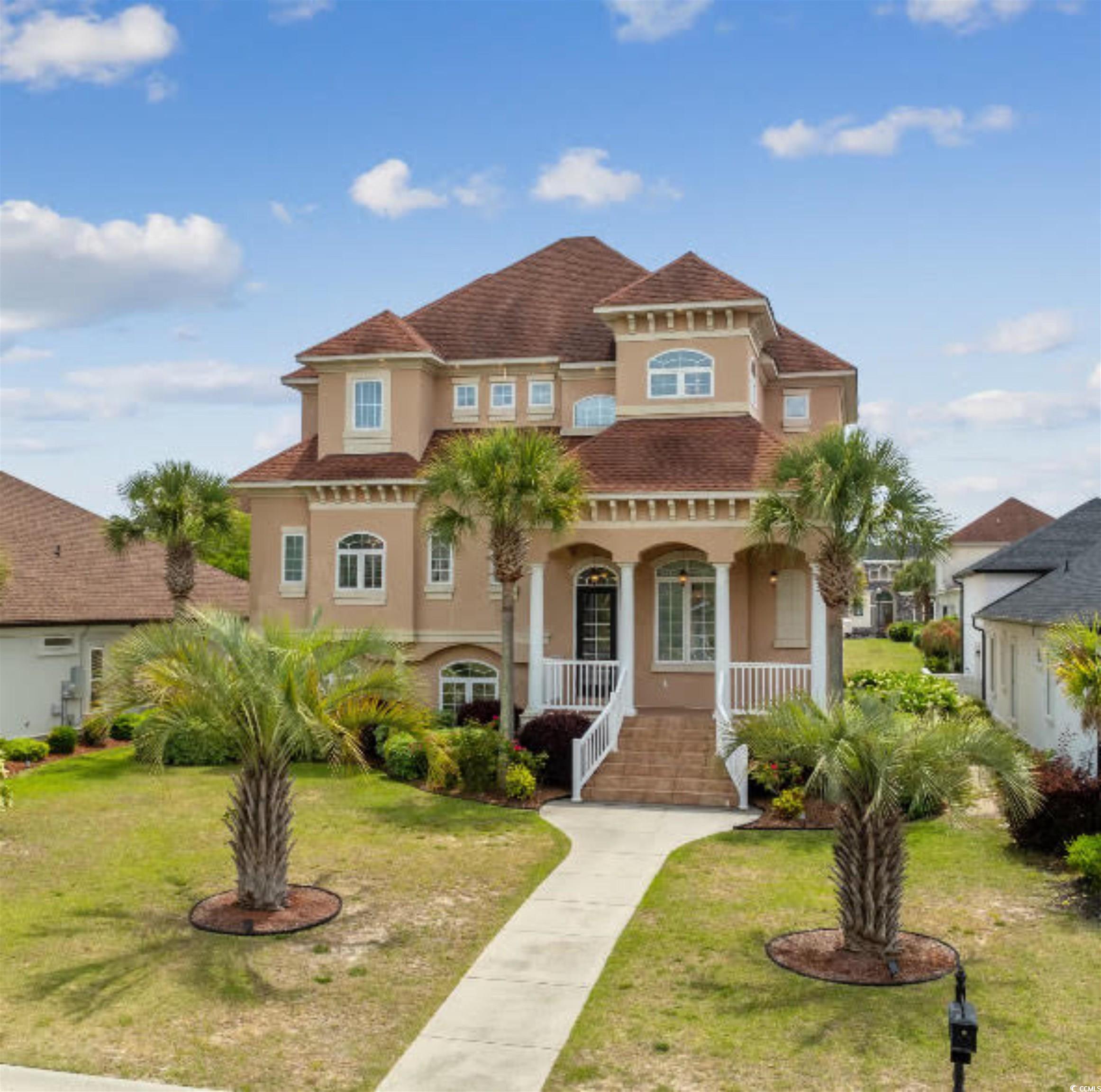 Mediterranean / spanish-style house featuring a po