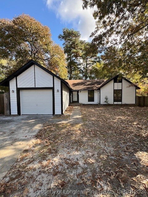 a house with trees in front of it