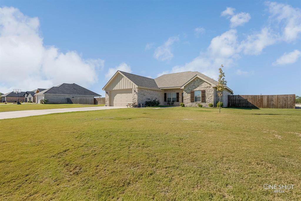 a view of house with ocean view