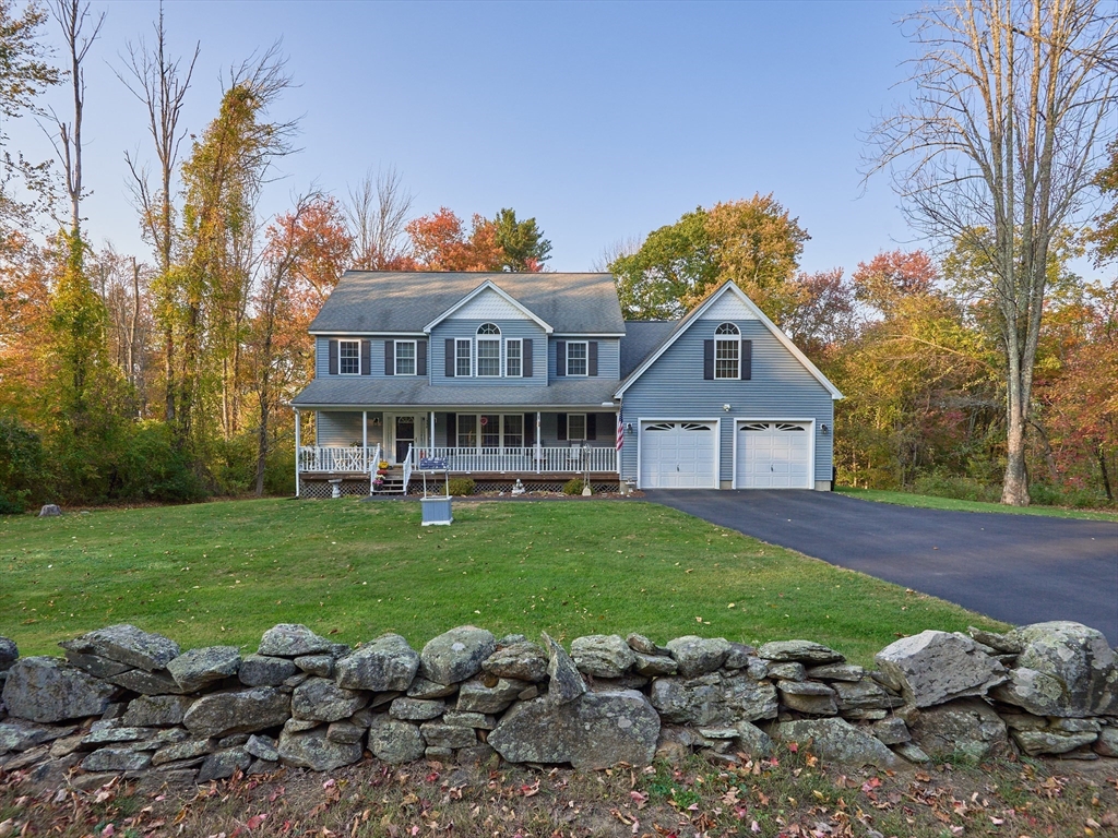 a view of a house with a big yard