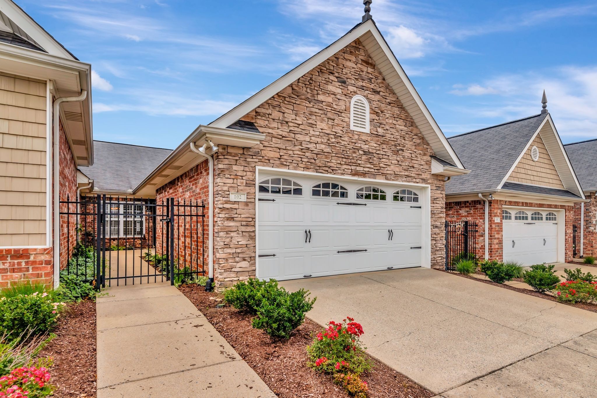 a view of a house with a garage