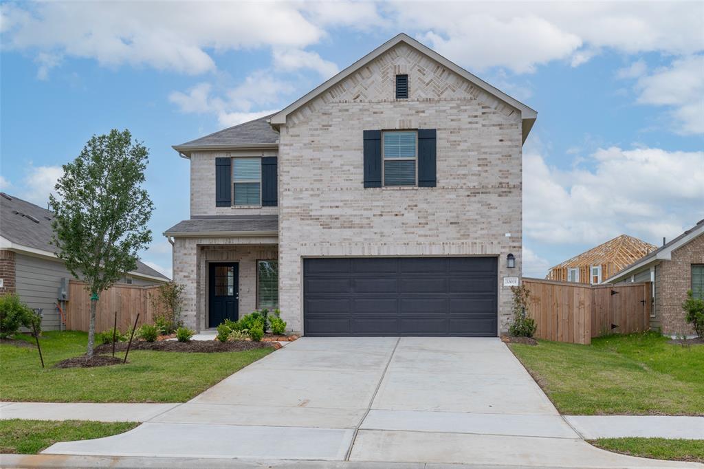 a front view of house with yard