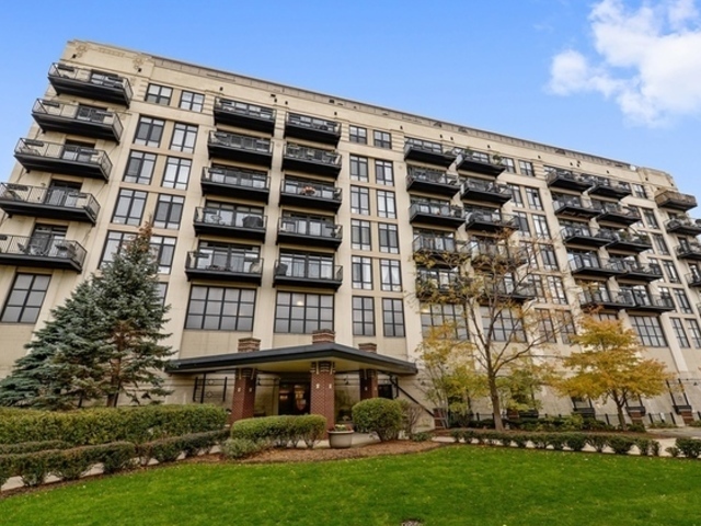 front view of a building with a yard