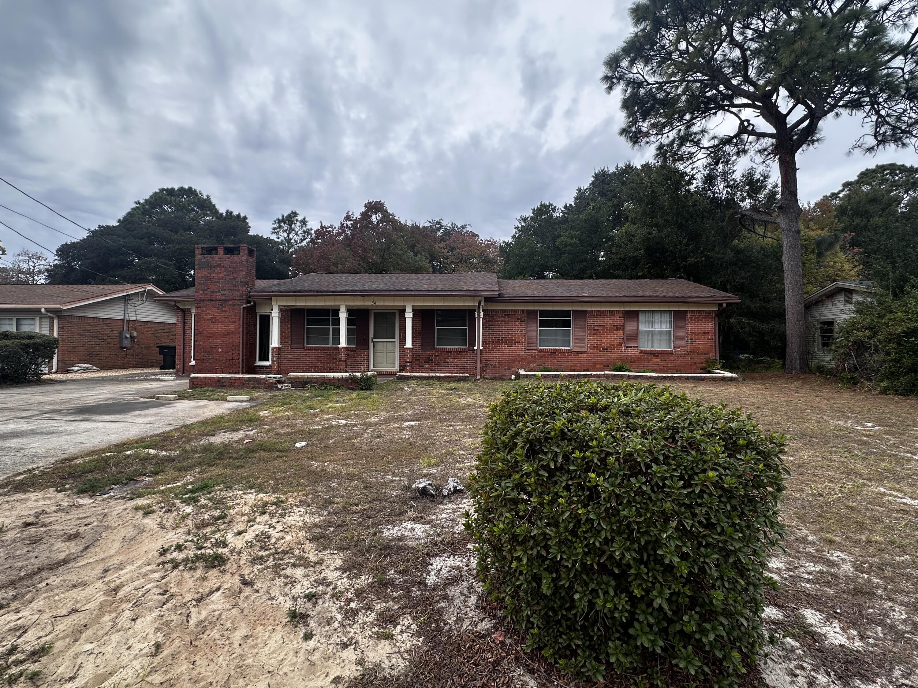 front view of a house with a small yard