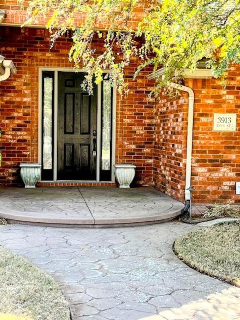 a view of entrance gate of a house