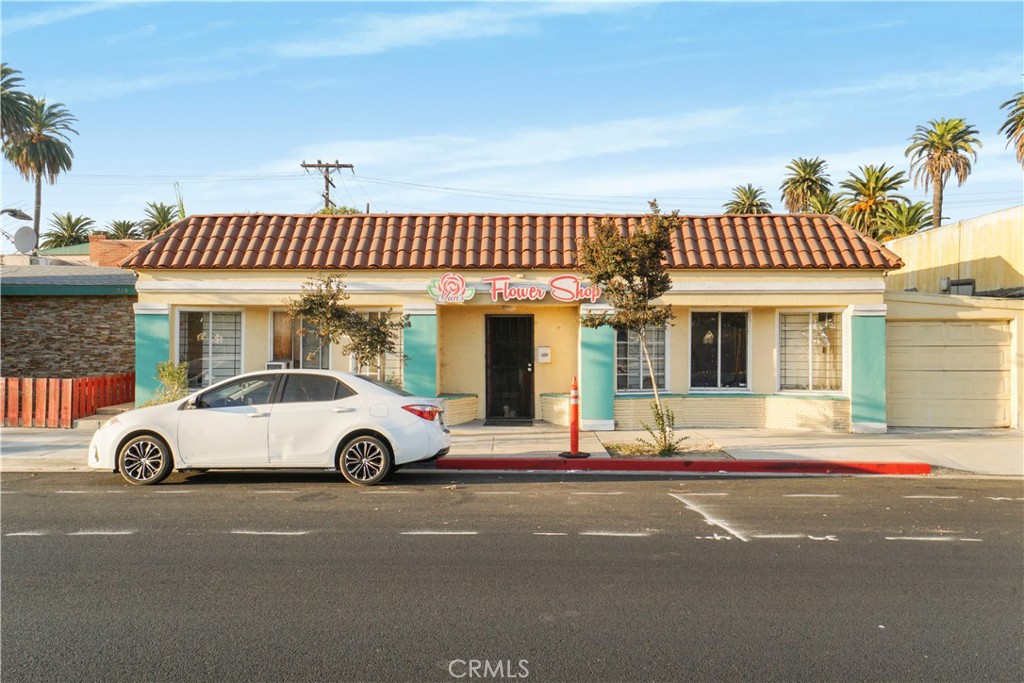 a car parked in front of a house