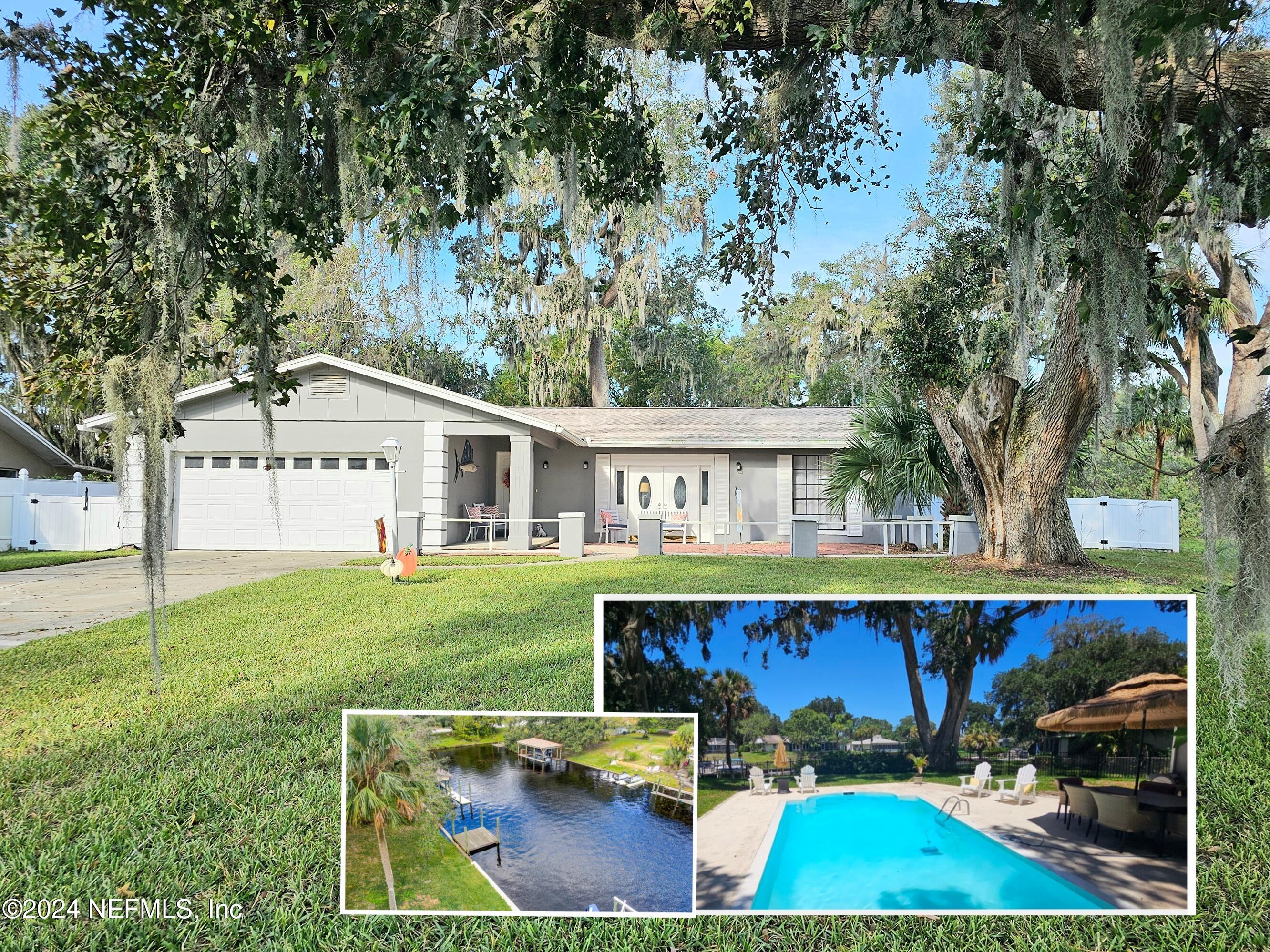 a view of house with outdoor space and swimming pool