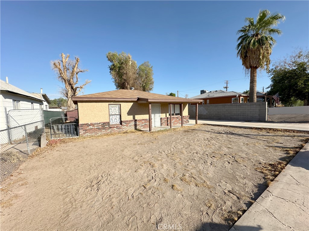 a view of a house with a patio