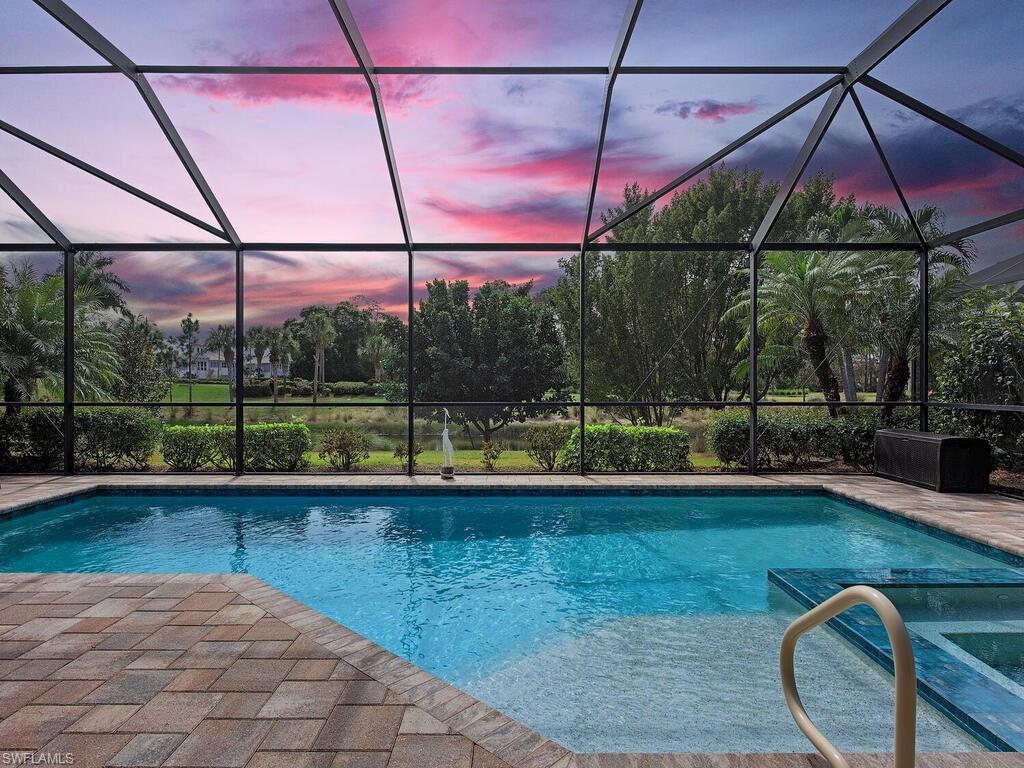 a view of a swimming pool with a porch