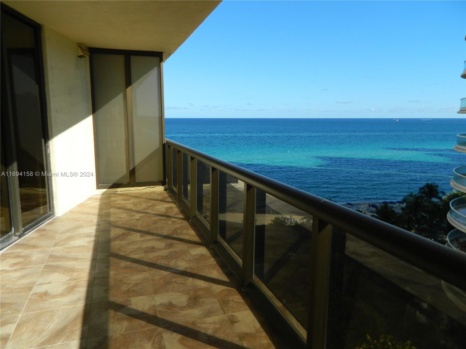 a view of balcony with ocean view