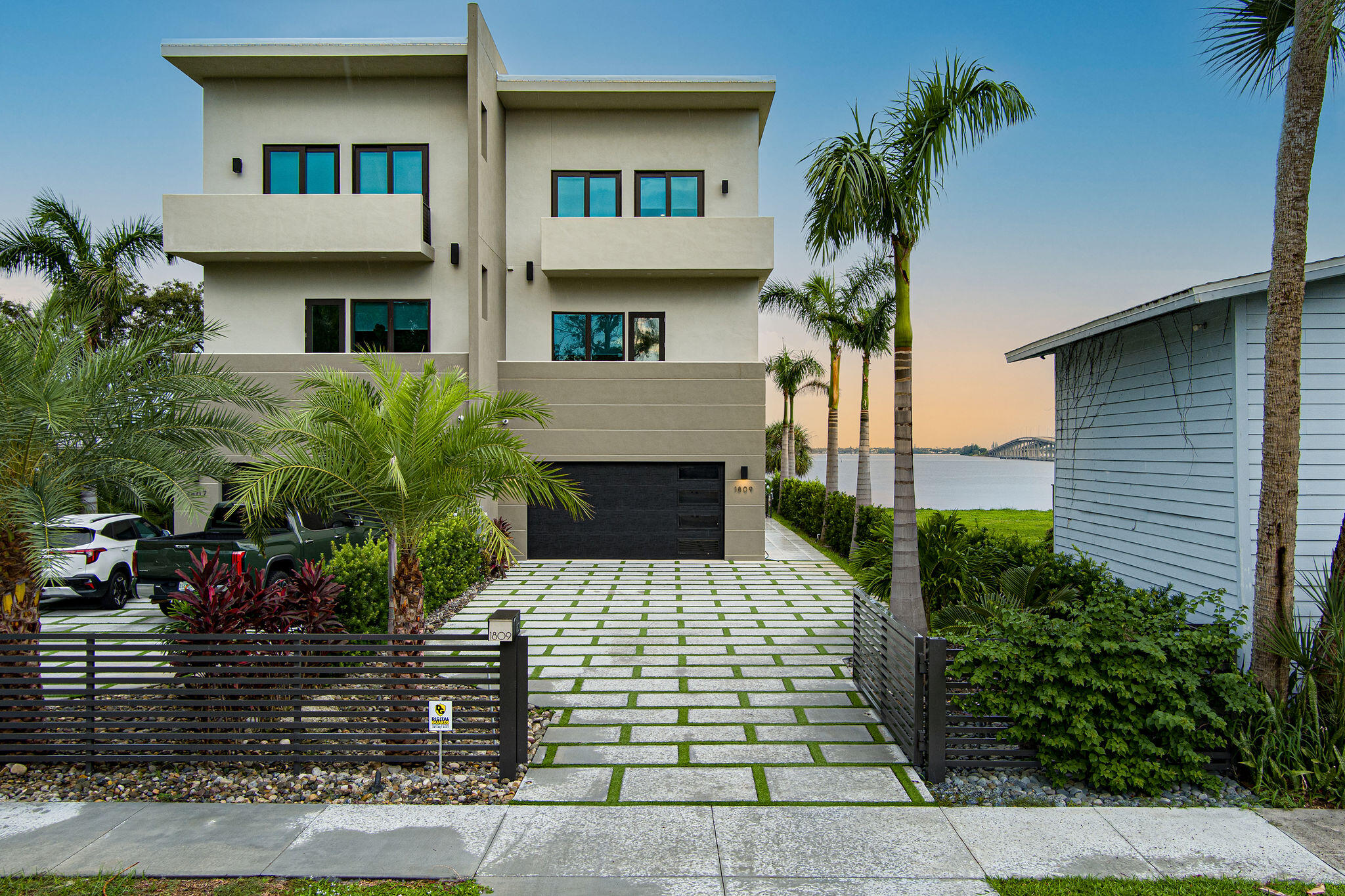 a front view of a house with garden