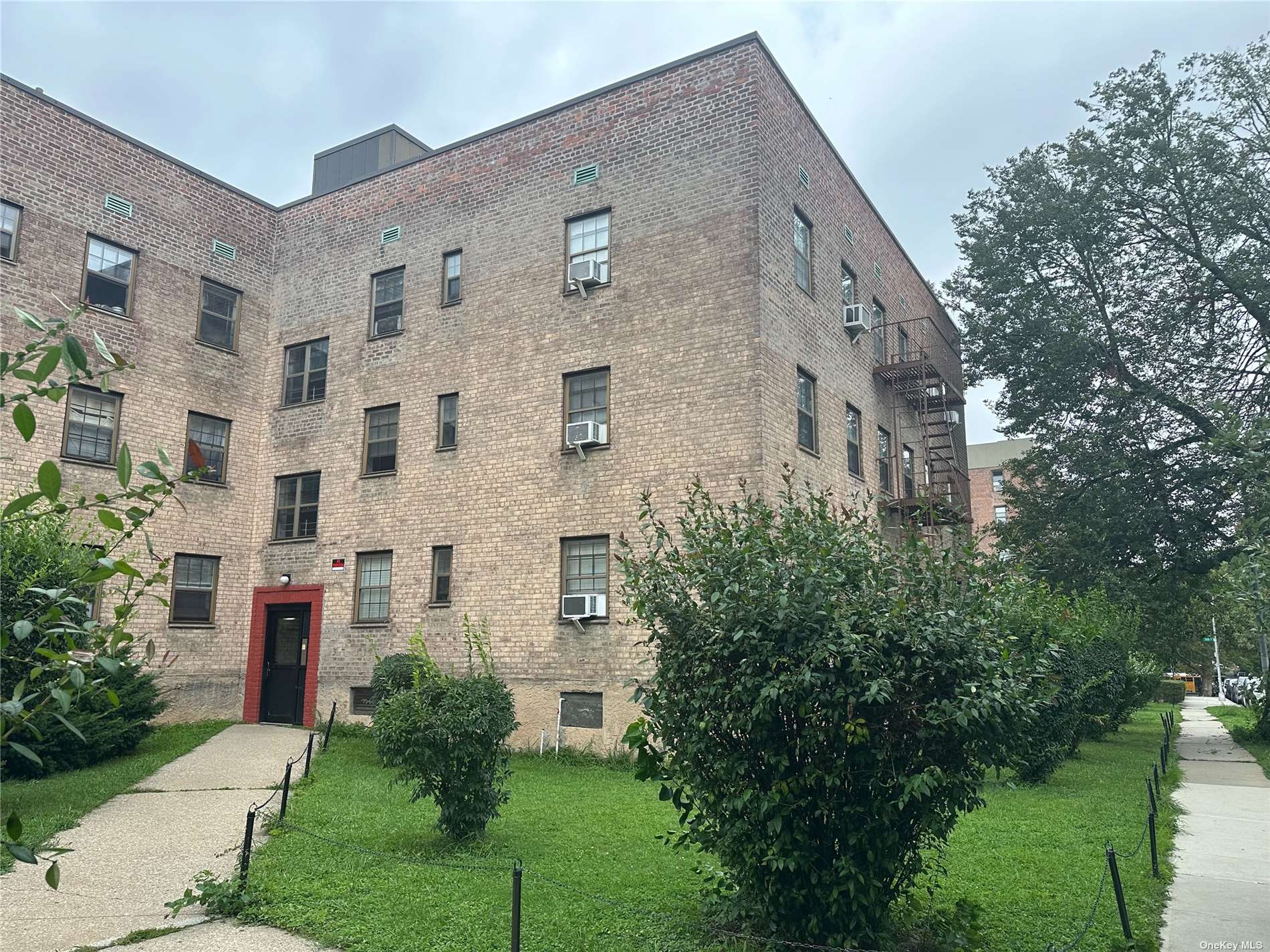 a view of a building with garden