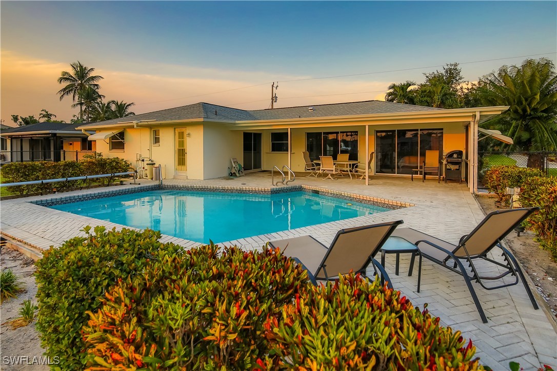 swimming pool view with seating space