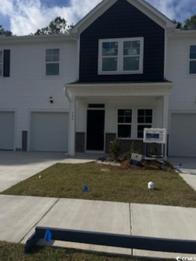 View of front facade with a garage