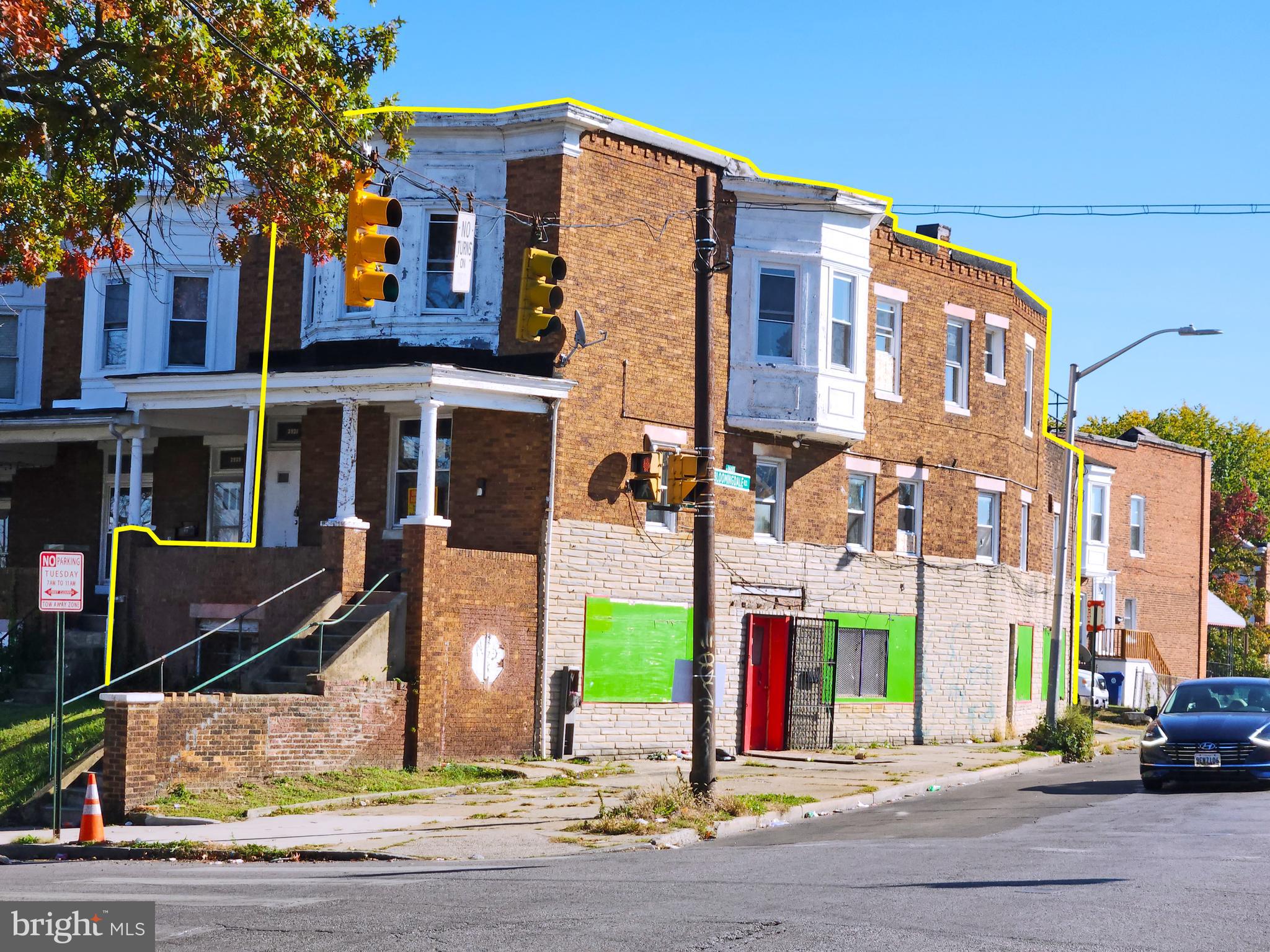 a front view of building with street