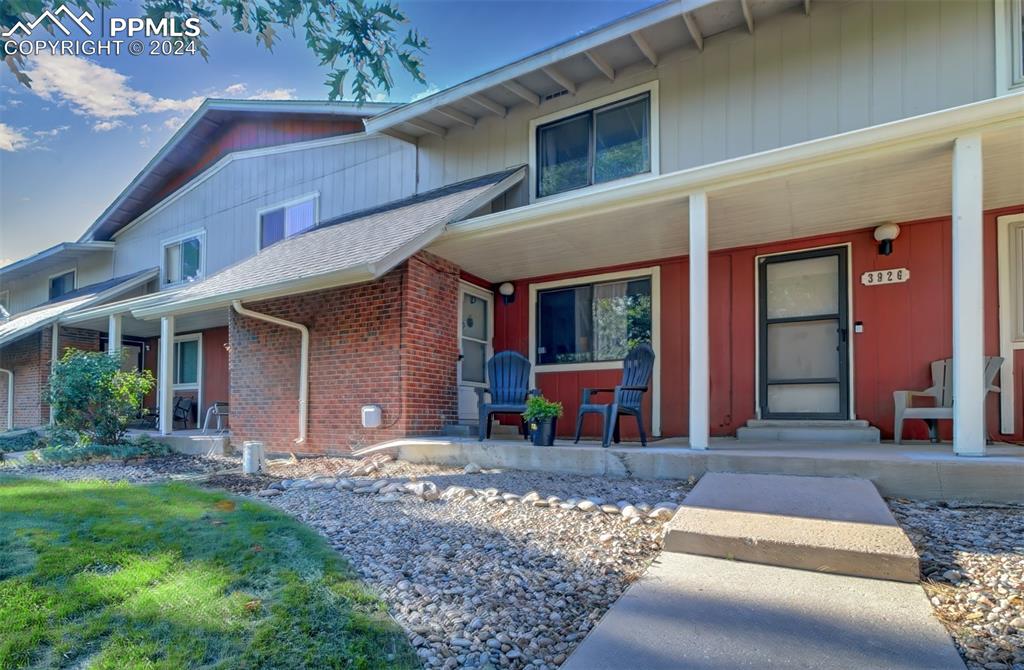 a front view of a house with patio