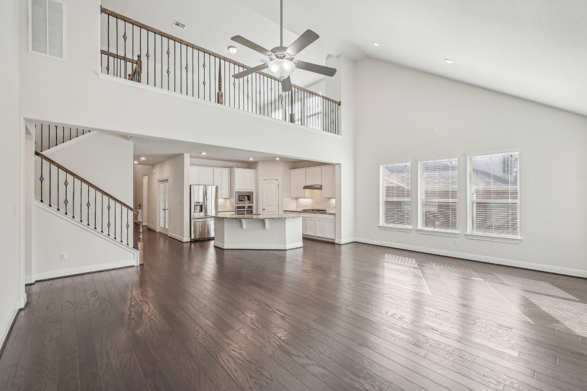 a view of an entryway with wooden floor