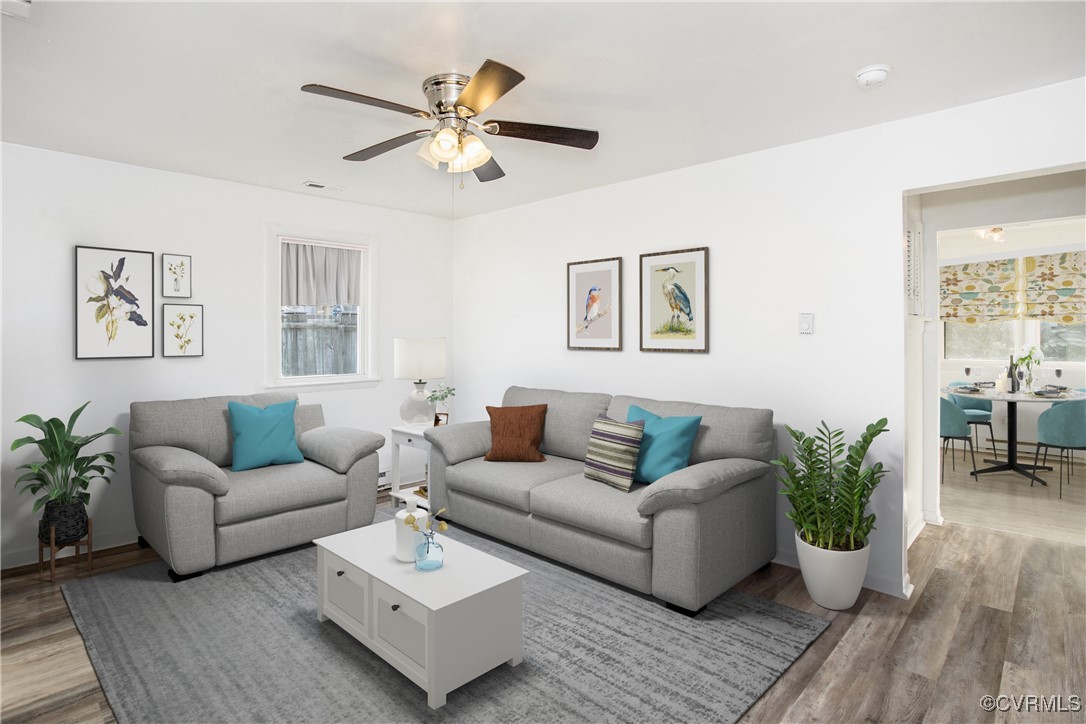 Living room with hardwood / wood-style floors, cei