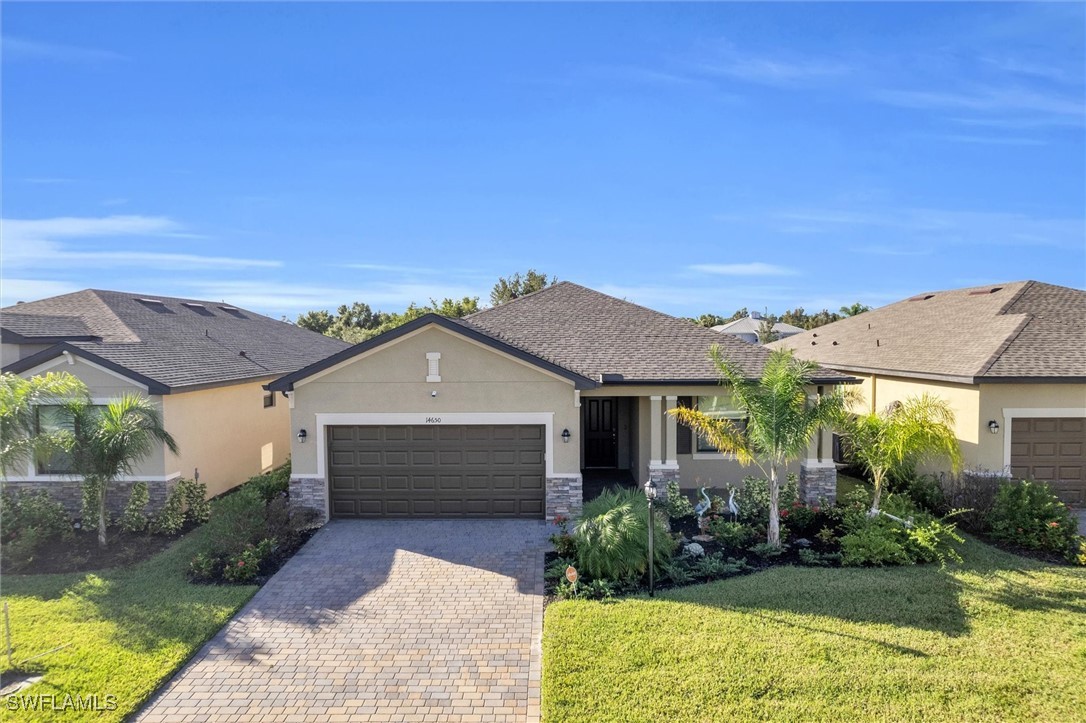 front view of a house with a yard