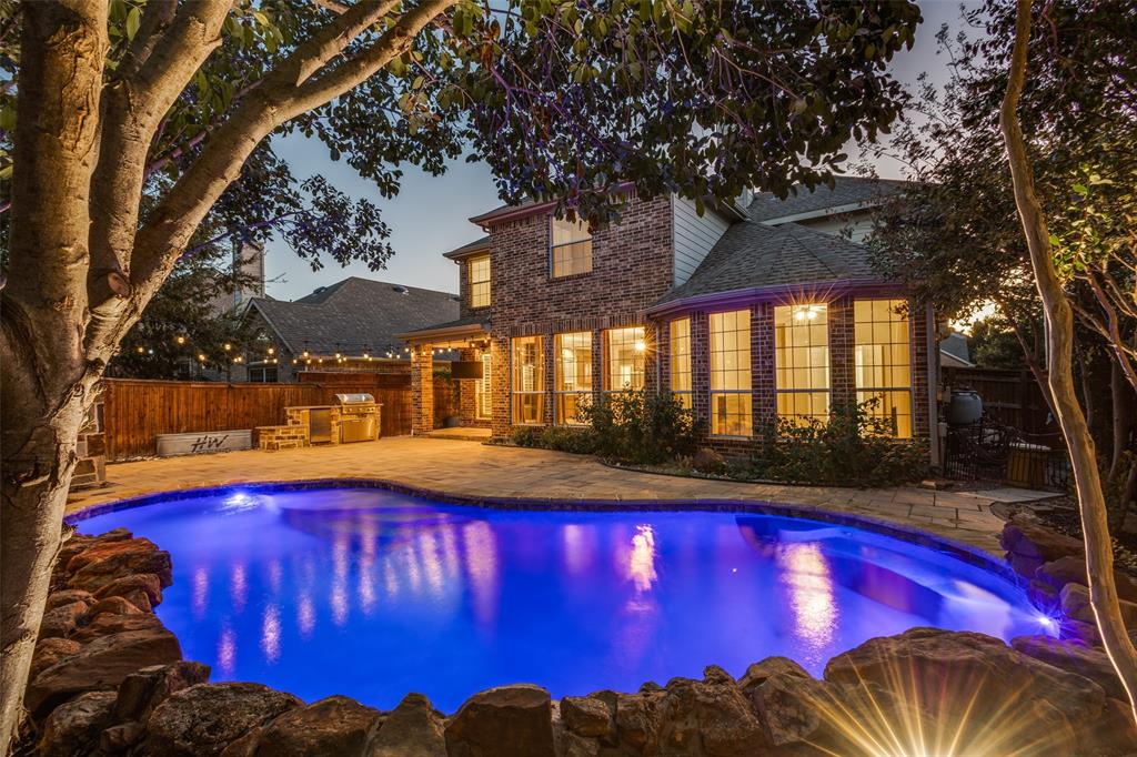 a view of swimming pool with outdoor seating