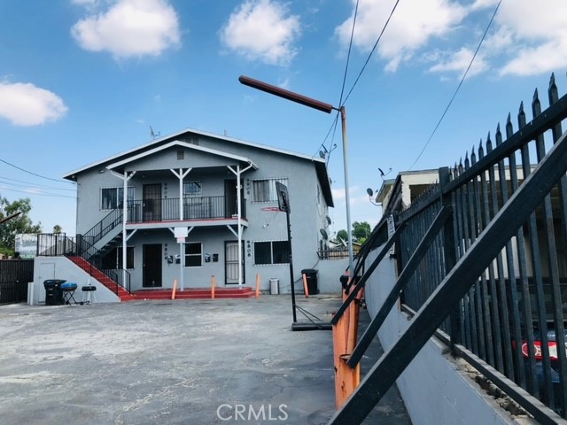 a front view of a house with stairs