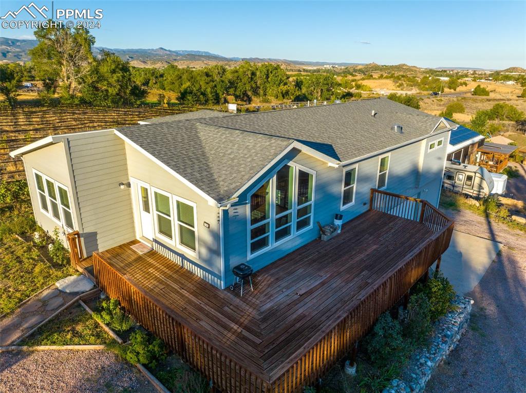 a aerial view of a house with a ocean view