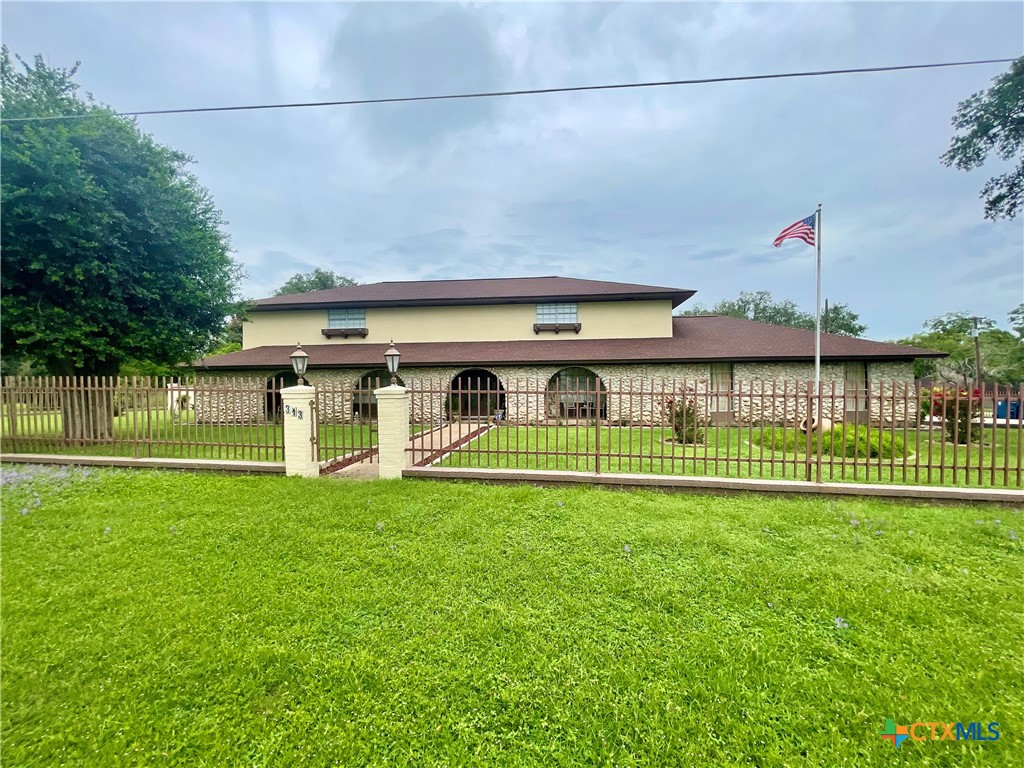 a view of a house with a big yard