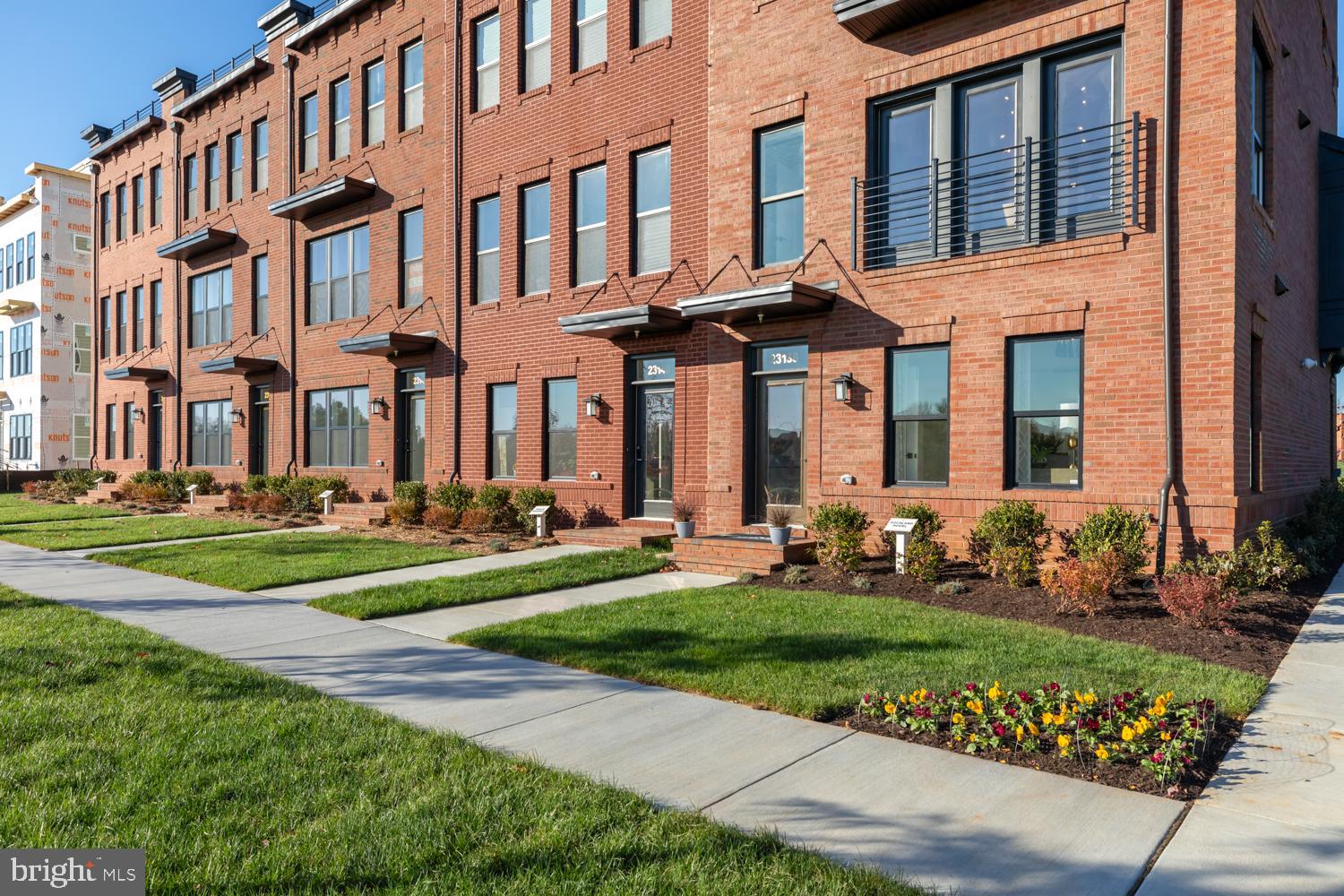 front view of a building with a yard