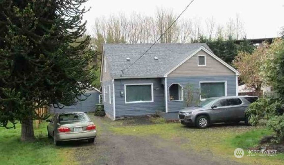 a car parked in front of a house