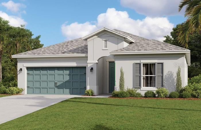 a front view of a house with a garden and garage