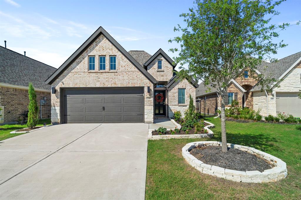 a front view of a house with yard