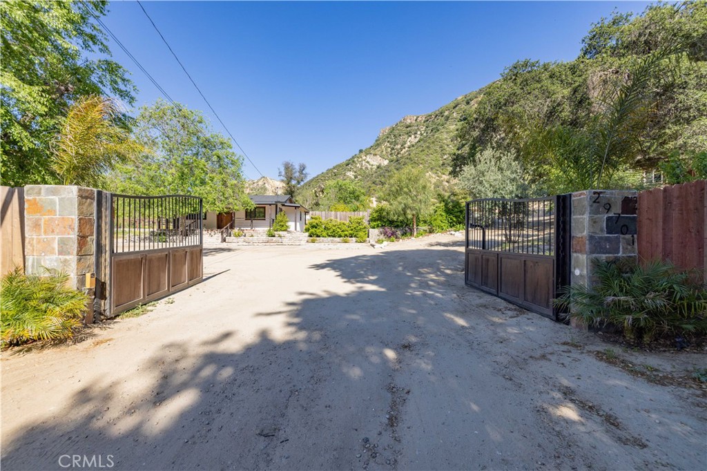 a view of a backyard of the house