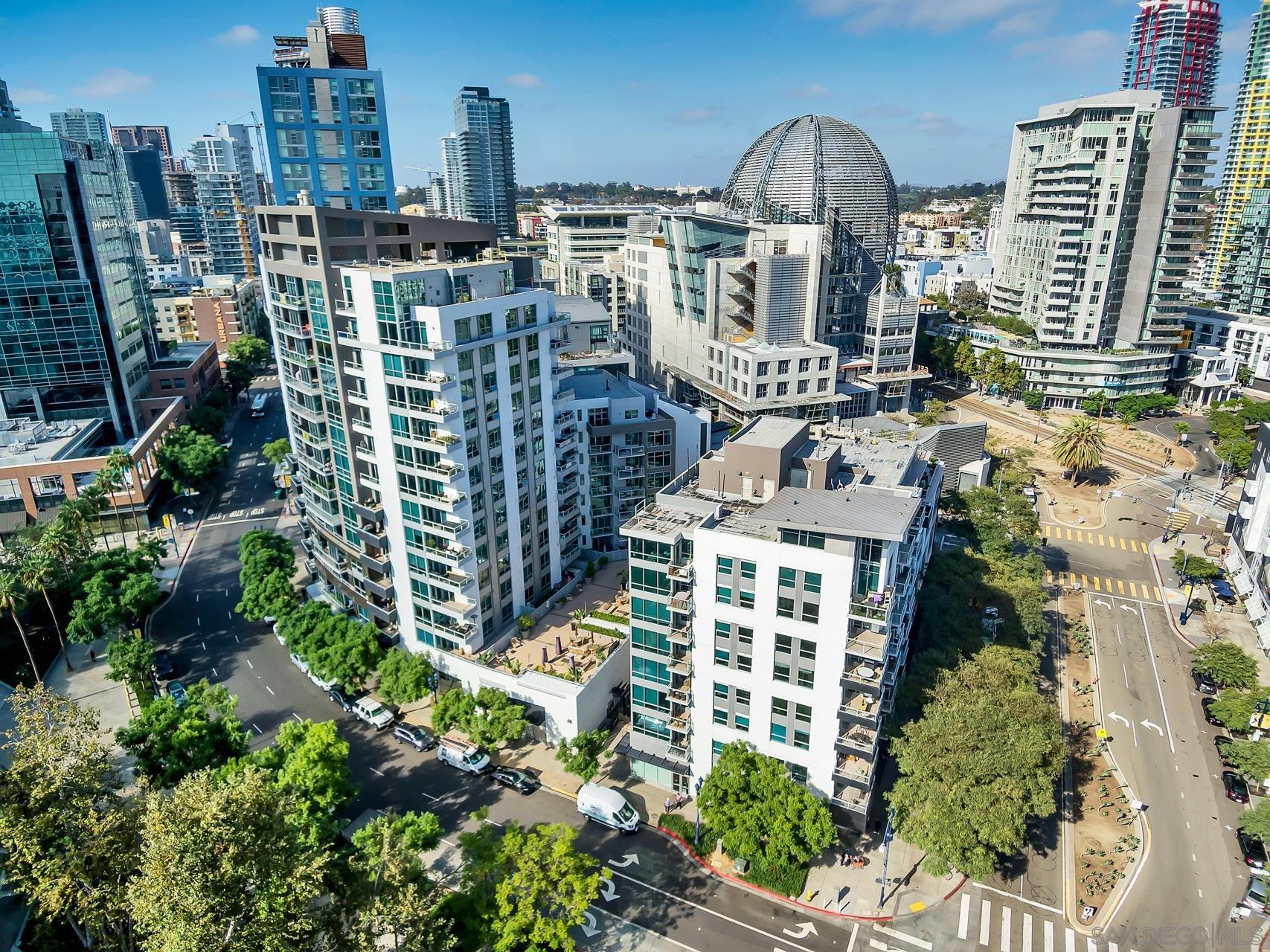 a view of a city with tall buildings