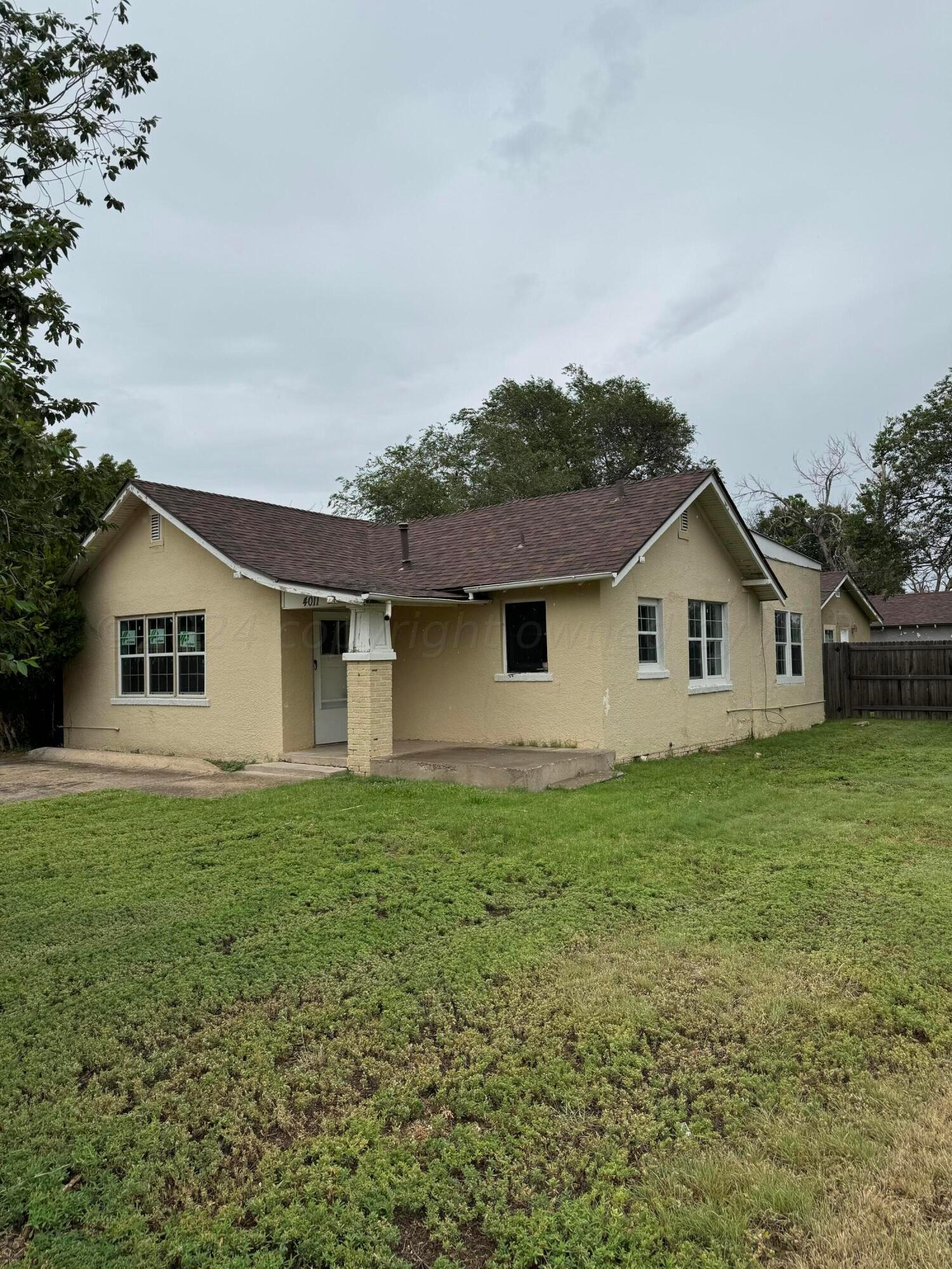 a house view with a garden space