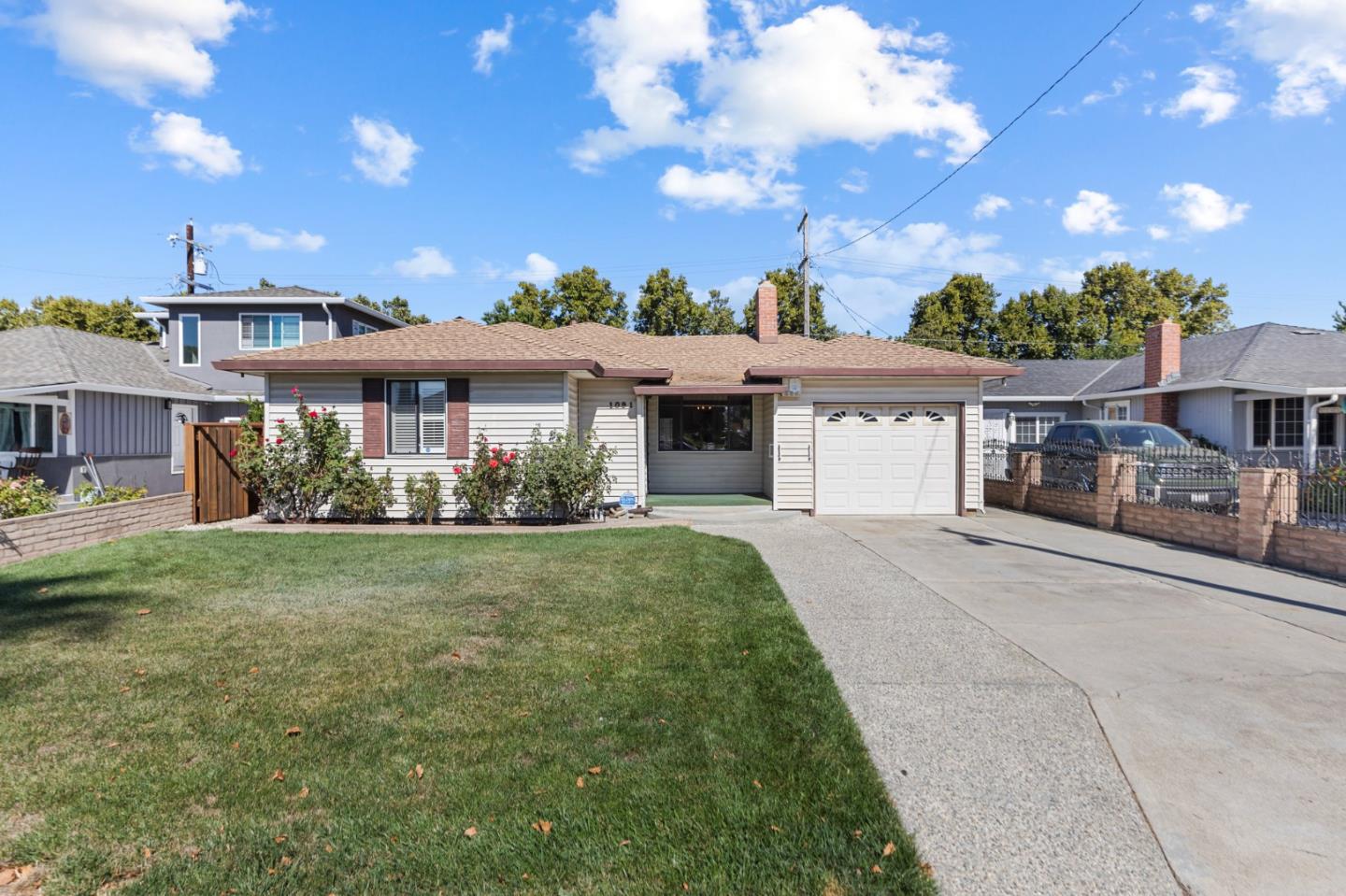 front view of a house with a yard