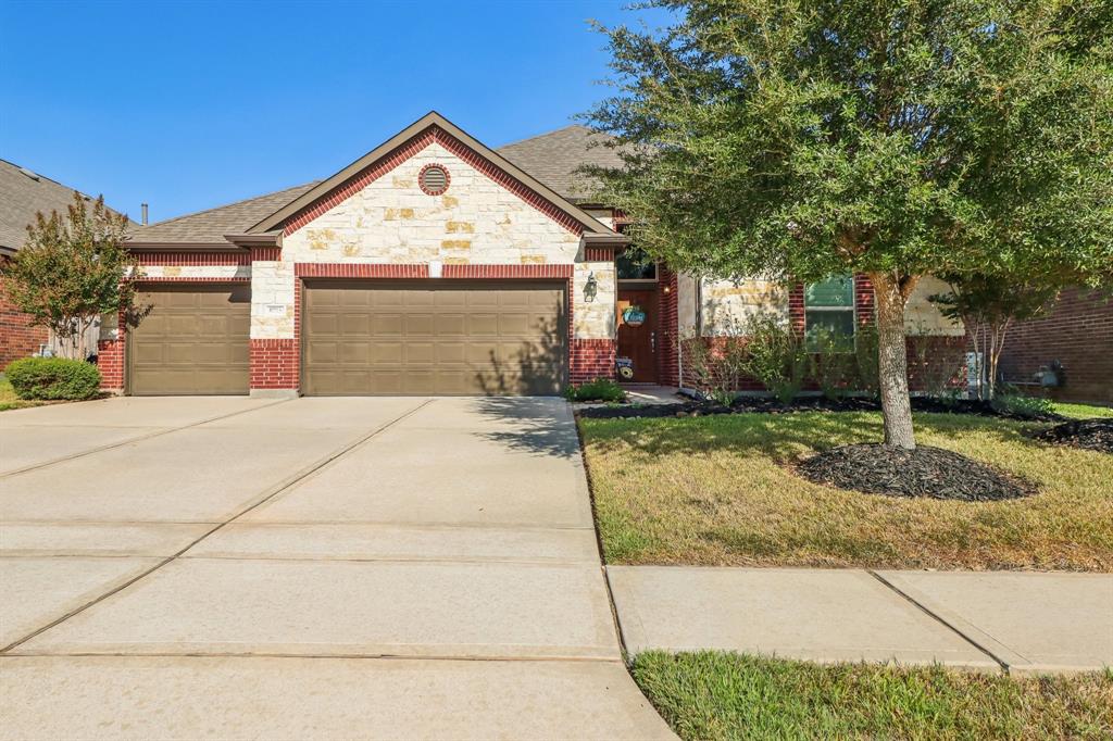 a front view of house with garage