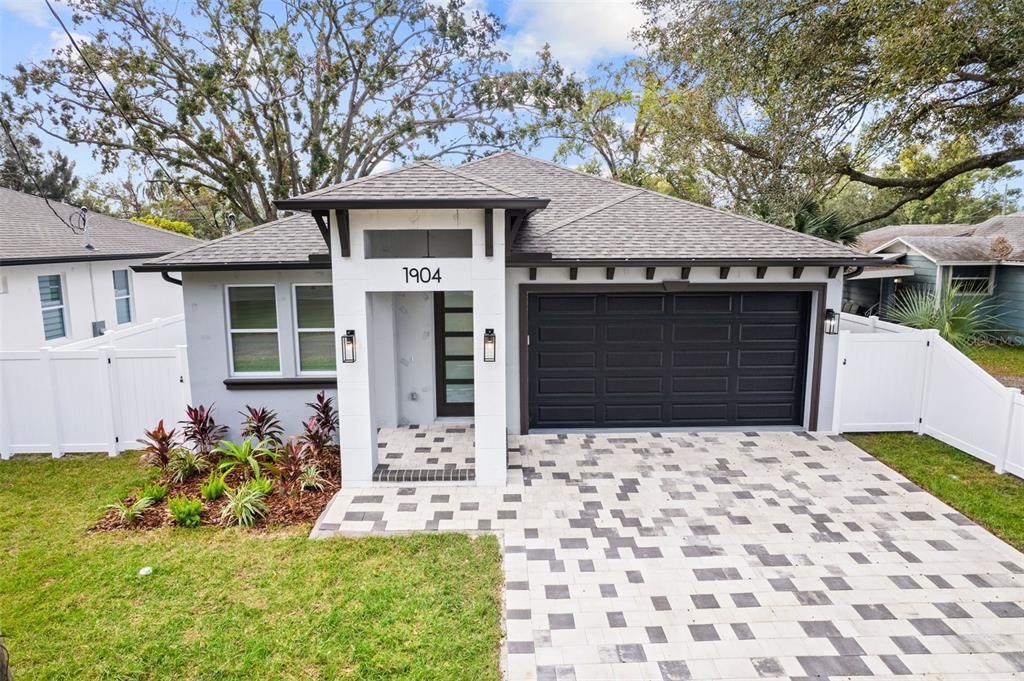 front view of a house with a yard