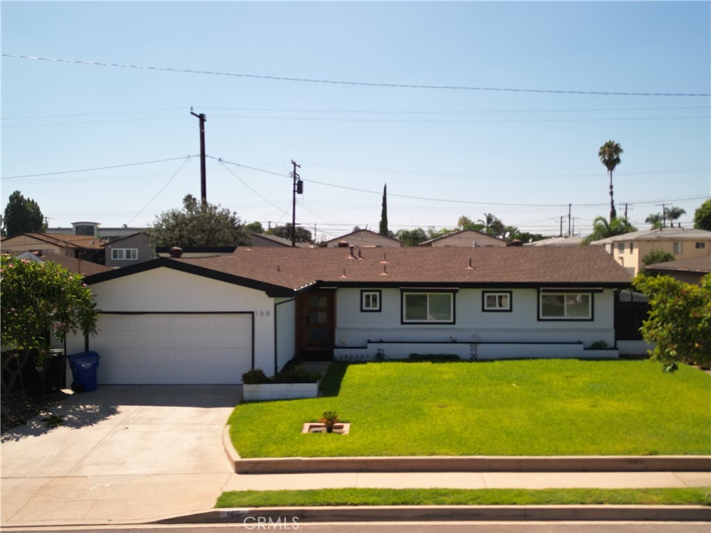 a view of a house with a swimming pool