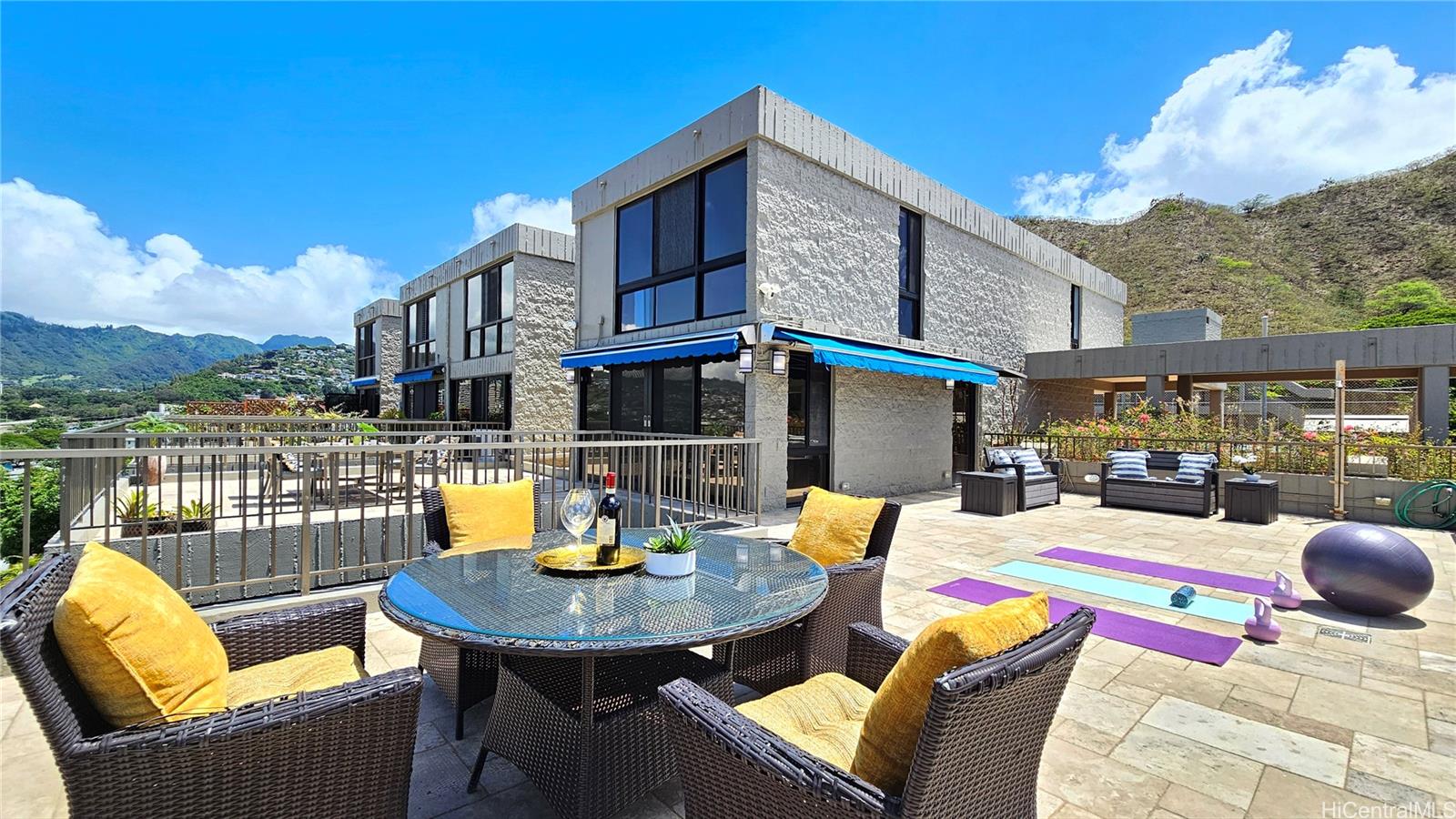 a view of a patio with couches table and chairs