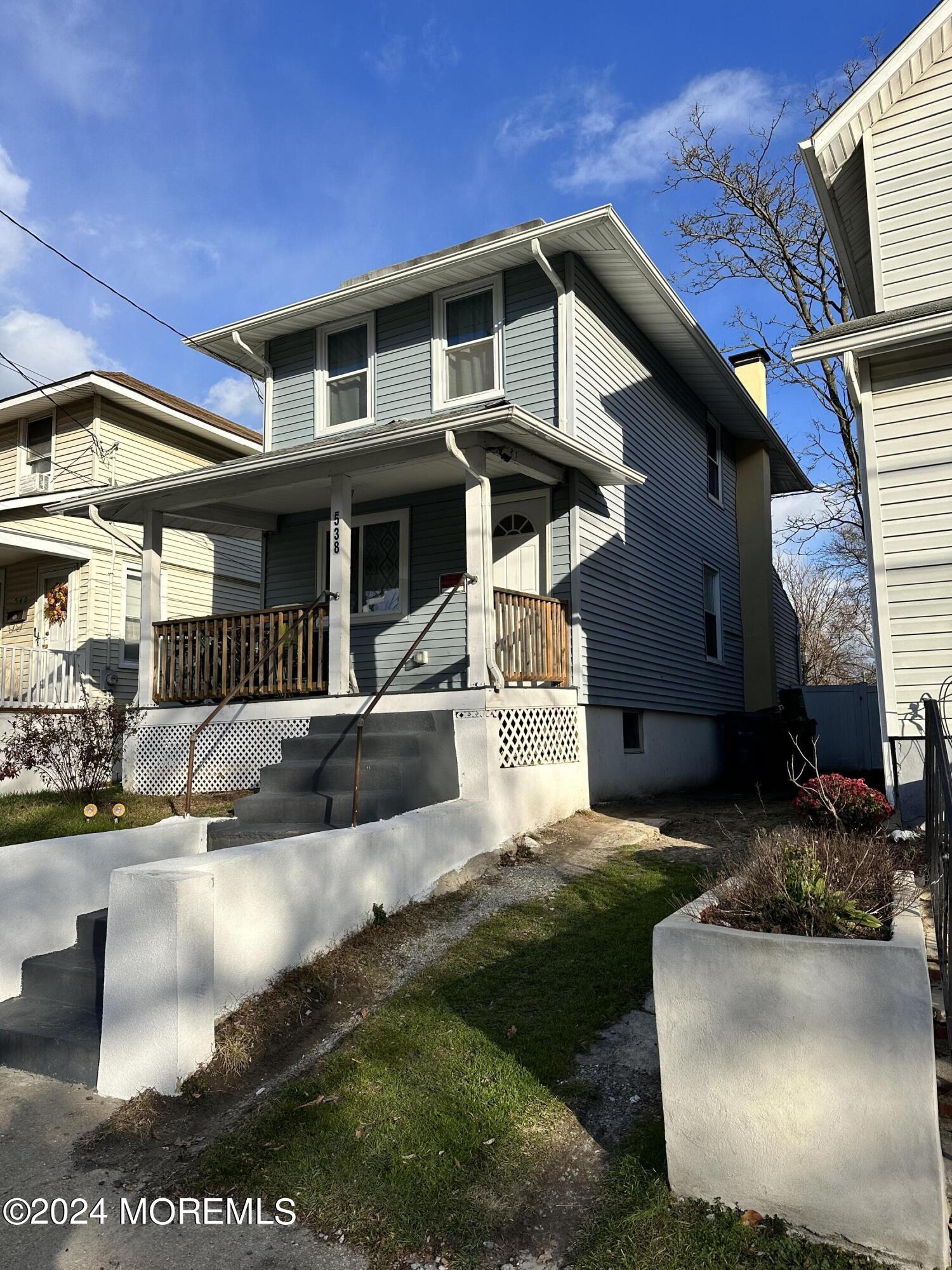 a front view of a house with entertaining space