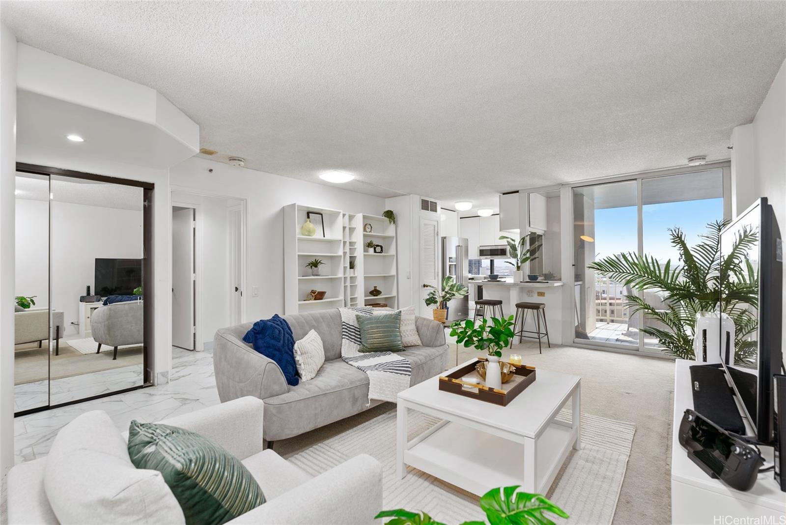 a living room with furniture and a flat screen tv