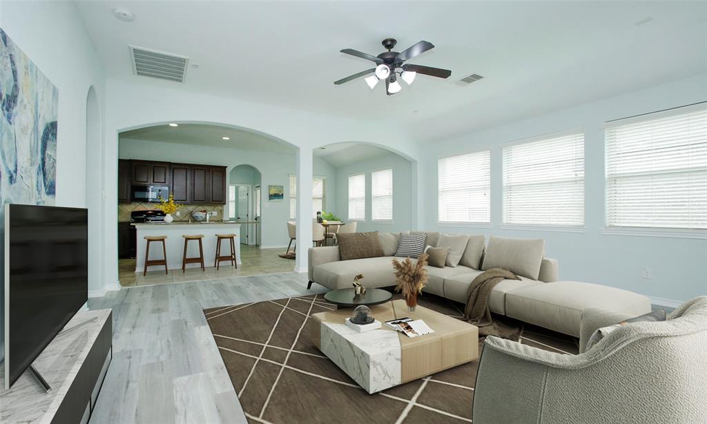 Open floorplan and an ABUNDANCE of natural light. Living area virtually staged.