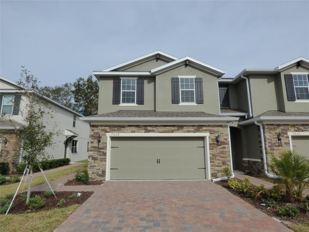 front view of a house with a garage