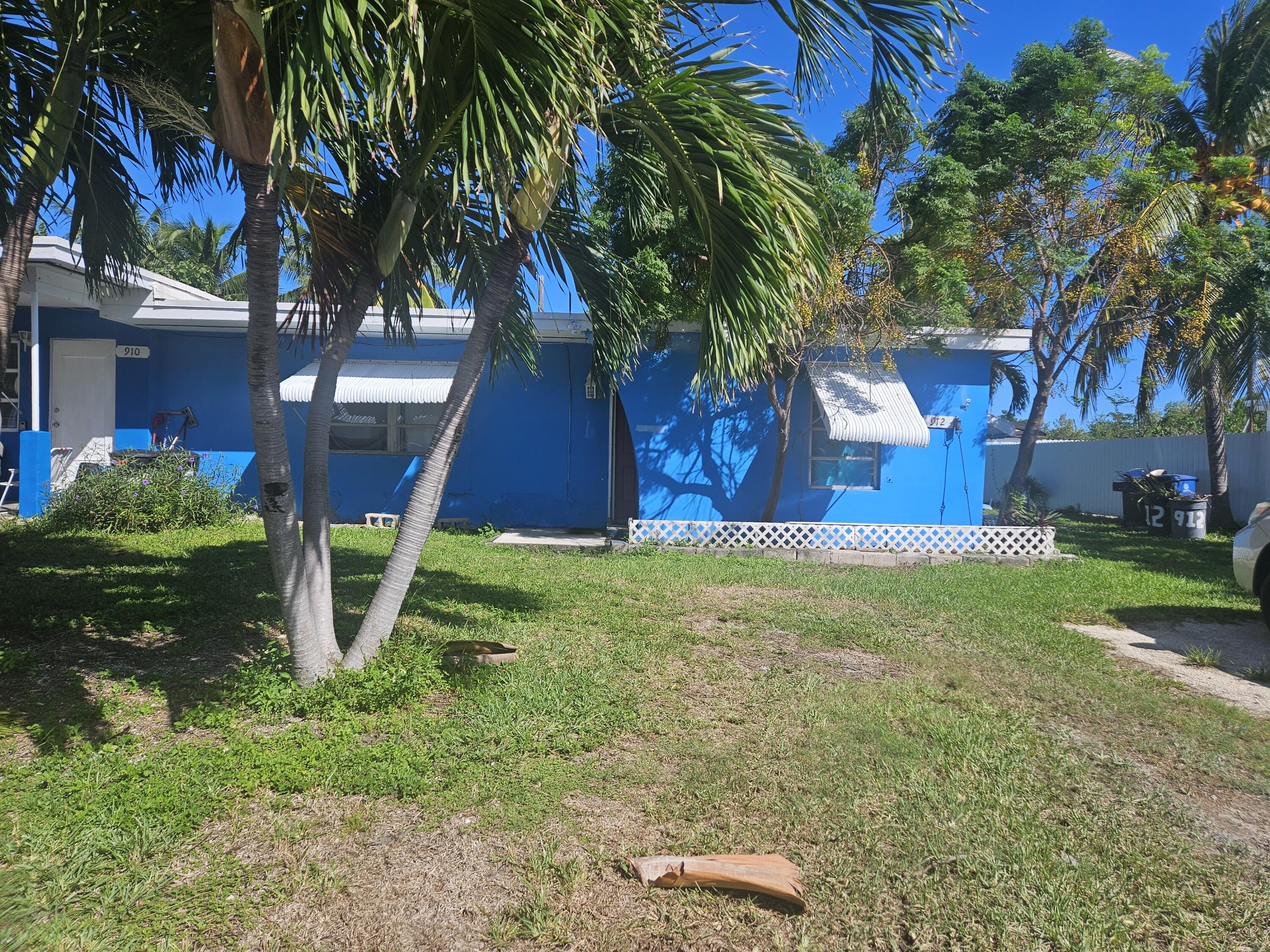 a house view with a backyard space