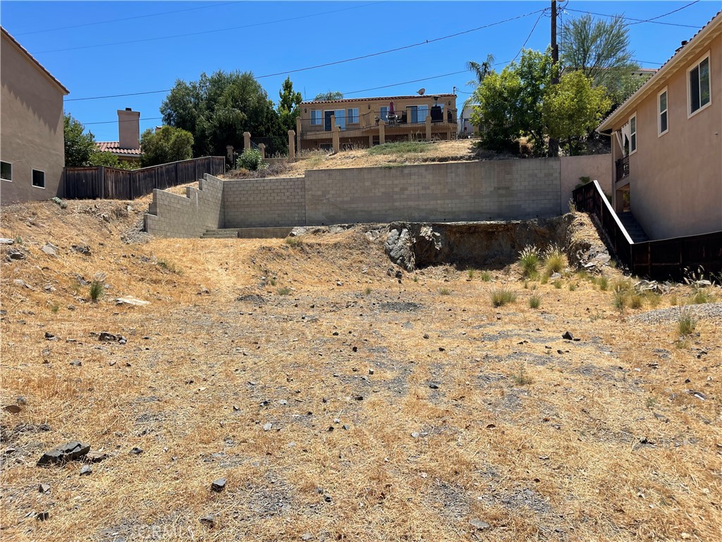 a view of swimming pool with a yard