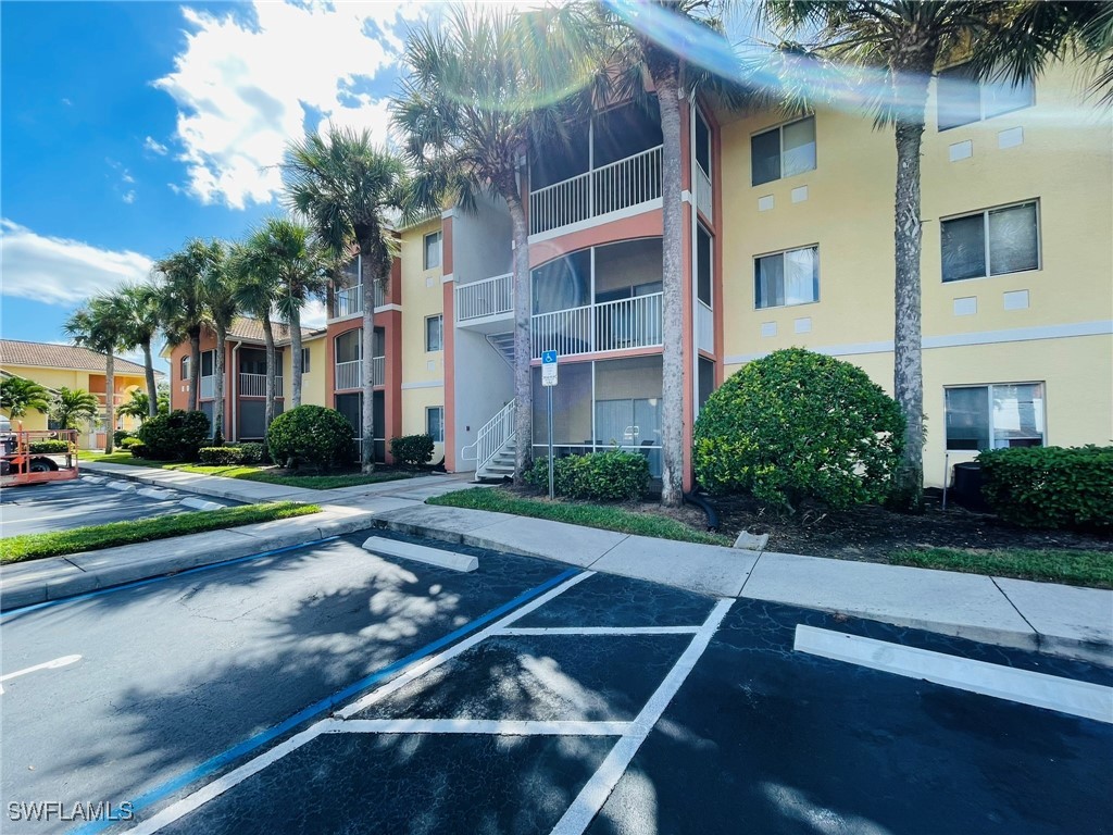 a view of a building with a yard